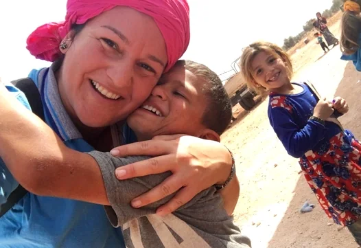 Soumaya Hallak with children in Syria