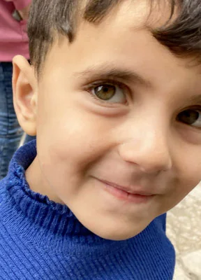 Portrait of a child met through the project