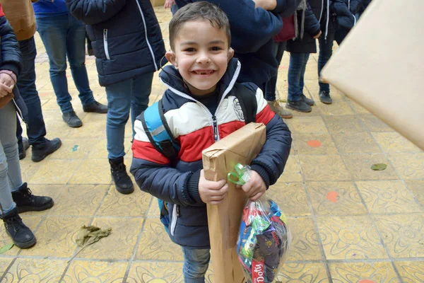 A child receives a gift during an activity