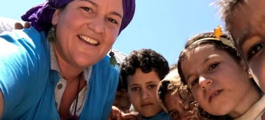 Soumaya Hallak surrounded by children